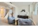 Comfortable living room featuring plush seating, neutral tones, and charming decorative touches at 9544 Josephine St, Thornton, CO 80229
