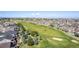 Wide aerial shot showcasing the golf course community and the surrounding neighborhood at 23644 E Phillips Pl, Aurora, CO 80016