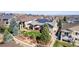 Aerial view of a home showcasing a well-maintained backyard and solar panels at 23644 E Phillips Pl, Aurora, CO 80016