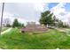 Well-maintained community entrance sign surrounded by landscaping at 23644 E Phillips Pl, Aurora, CO 80016
