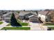 Beautiful home with an attached garage, manicured lawn, and lovely curb appeal at 23644 E Phillips Pl, Aurora, CO 80016