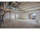 Unfinished basement with concrete floor and white wrapped walls, ready for customization and expansion at 1110 Black Saddle St, Elizabeth, CO 80107