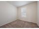 Cozy bedroom with neutral carpet, natural lighting, and a serene atmosphere at 1110 Black Saddle St, Elizabeth, CO 80107