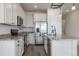 Well-equipped kitchen featuring granite countertops, stainless steel appliances, and ample cabinet space at 1110 Black Saddle St, Elizabeth, CO 80107