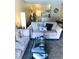 Cozy living room with comfortable seating and a glass coffee table at 2500 S York St # 213, Denver, CO 80210