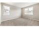 Neutral bedroom with carpet and window with blinds at 13497 Valentia St, Thornton, CO 80602