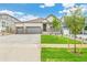 Charming single-Gathering home featuring a covered porch and a spacious three-car garage at 13497 Valentia St, Thornton, CO 80602