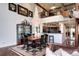 Elegant dining room featuring a stunning chandelier and a view of the modern kitchen at 1900 E Girard Pl # 901, Englewood, CO 80113