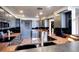 Modern kitchen with stainless steel appliances, unique countertops, and ample cabinet space at 1900 E Girard Pl # 901, Englewood, CO 80113