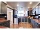 Contemporary kitchen featuring modern appliances, ample countertop space, and stylish cabinetry at 1900 E Girard Pl # 901, Englewood, CO 80113