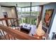 Grand living room boasts two-story windows, a fireplace, and an elegant chandelier at 1900 E Girard Pl # 901, Englewood, CO 80113