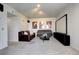Cozy living room with a home theater setup, plush seating, and neutral decor at 1900 E Girard Pl # 901, Englewood, CO 80113