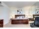 Main bedroom featuring a statement headboard, mirrored wall, and serene decor at 1900 E Girard Pl # 901, Englewood, CO 80113