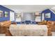 Cozy living room with a projector screen, built-in shelving, and leather seating for a home theater experience at 2590 S Independence St, Lakewood, CO 80227