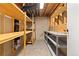 Unfinished basement with multiple storage shelves at 3907 E 133Rd Ct, Thornton, CO 80241
