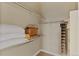 Walk-in closet features built-in shelving for optimal storage at 10111 Inverness Main St # 312, Englewood, CO 80112
