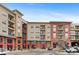 Apartment buildings with storefronts for retail, restaurants and beauty shops at 10111 Inverness Main St # 312, Englewood, CO 80112