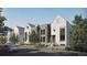 Stylish townhomes boasting unique architectural details and landscaping, creating an inviting street view at 532 Lombardi Cir, Louisville, CO 80027