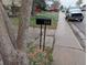 View of home's address number 220 on mailbox near the curb showing the street side appeal at 220 Mckinley Dr, Bennett, CO 80102