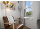 Comfortable chair and side table are located next to a window at 9300 E Florida Ave # 1202, Denver, CO 80247