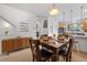 Dining area features an open layout and flows into the modern kitchen at 9300 E Florida Ave # 1202, Denver, CO 80247