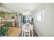 Inviting dining room with stylish decor, flowing seamlessly into the kitchen at 3080 N Cook St, Denver, CO 80205