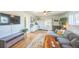 Stylish living room showcasing hardwood floors, modern furnishings, and ample natural light at 3080 N Cook St, Denver, CO 80205