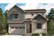 Charming two-story home featuring a covered porch, two-car garage, and landscaped yard at 45927 Wood Thrush Ave, Bennett, CO 80102