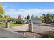Beautiful single Gathering home featuring a well-manicured lawn and an attached two-car garage at 34 Skyline Dr, Wheat Ridge, CO 80215