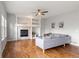 Cozy living room with hardwood floors, fireplace, and built-in shelving at 5604 S Shawnee St, Aurora, CO 80015