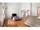 Inviting living room with hardwood floors and staircase at 5604 S Shawnee St, Aurora, CO 80015