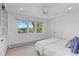 Bright bedroom with large window and built-in storage at 700 Utica Ave, Boulder, CO 80304