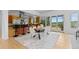 Open dining area featuring lots of natural light and views of the yard at 700 Utica Ave, Boulder, CO 80304