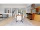 Dining room featuring hardwood floors, seating for six, and an open floor plan at 700 Utica Ave, Boulder, CO 80304