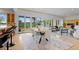 Bright dining area with hardwood floors, an open layout, and scenic views at 700 Utica Ave, Boulder, CO 80304