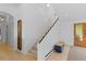 Entryway showcasing stairs, unique decor, and a well-lit space with natural light at 700 Utica Ave, Boulder, CO 80304