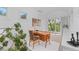 Bright and airy office space featuring a mid-century modern desk with outdoor views at 700 Utica Ave, Boulder, CO 80304