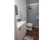 Bathroom featuring a modern vanity, a toilet, and a glass-enclosed shower with sleek fixtures at 245 Lower Glenway St, Palmer Lake, CO 80133