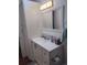 Bathroom featuring a modern sink and vanity with ample storage, plus stylish fixtures and lighting at 245 Lower Glenway St, Palmer Lake, CO 80133
