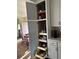 Well-organized pantry with custom pull-out drawers and ample storage, next to a dining area at 245 Lower Glenway St, Palmer Lake, CO 80133