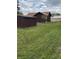 Spacious yard and charming exterior of a cozy home, offering a serene outdoor setting at 245 Lower Glenway St, Palmer Lake, CO 80133