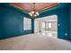 Dining room featuring blue accent walls, and a chandelier at 5395 S Flanders Way, Centennial, CO 80015