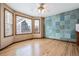 Eat-in kitchen featuring hardwood floors, three windows and a ceiling fan with light fixture at 5395 S Flanders Way, Centennial, CO 80015