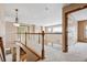 Hallway that includes a staircase, carpet, and an open railing at 5395 S Flanders Way, Centennial, CO 80015