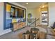 Stylish upstairs living area with television, comfortable seating, and scenic views create a relaxing ambiance at 834 N Bently St, Watkins, CO 80137