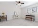 Bright bedroom with neutral walls and carpet and large window. Features modern furnishings at 13648 W 66Th Way, Arvada, CO 80004