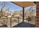 Balcony with wood ceiling offers expansive neighborhood views and fresh air at 2230 W 36Th Ave, Denver, CO 80211