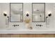 Bright bathroom featuring a double sink vanity, wall sconces, and modern fixtures at 2230 W 36Th Ave, Denver, CO 80211