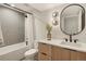 Bathroom featuring modern fixtures, gray tile work, and a shower-tub combination at 2230 W 36Th Ave, Denver, CO 80211