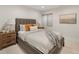 Comfortable bedroom features warm lighting, stylish bedside tables, and a patterned bedspread at 2230 W 36Th Ave, Denver, CO 80211